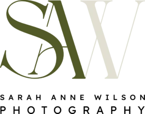 Logo with large overlapping letters “S” in teal and “W” in light green, with the word “PHOTOGRAPHY” in black uppercase letters below.